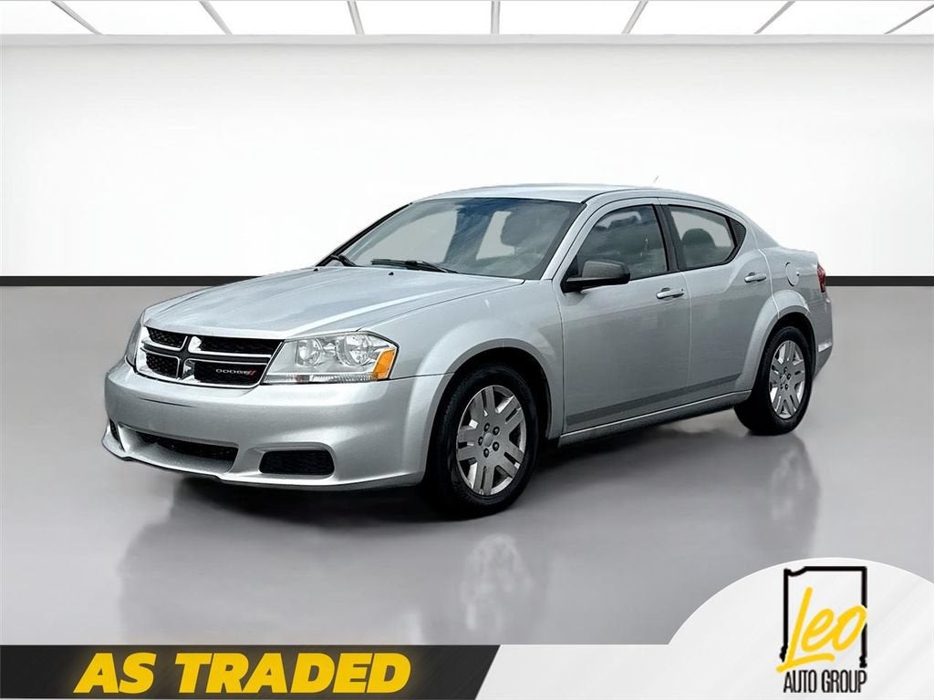 2012 Dodge Avenger SE in Silver — front three-quarter view