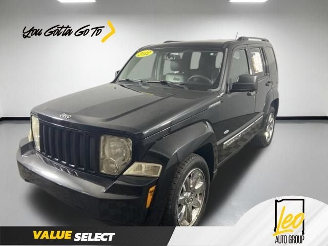 2012 Jeep Liberty Sport in Black — front three-quarter view