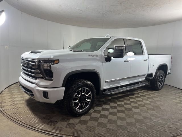 2026 Chevrolet Silverado 2500 HD High Country in Polar White Tricoat — front three-quarter view