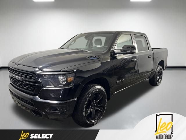 2023 RAM 1500 Big Horn Crew Cab 4x4 5'7' Box in Diamond Black Crystal Pearlcoat — front three-quarter view