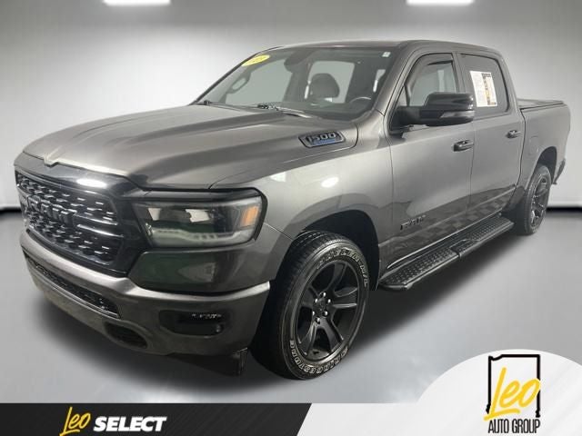 2023 RAM 1500 Big Horn Crew Cab 4x4 5'7' Box in Granite Crystal Metallic Clearcoat — front three-quarter view