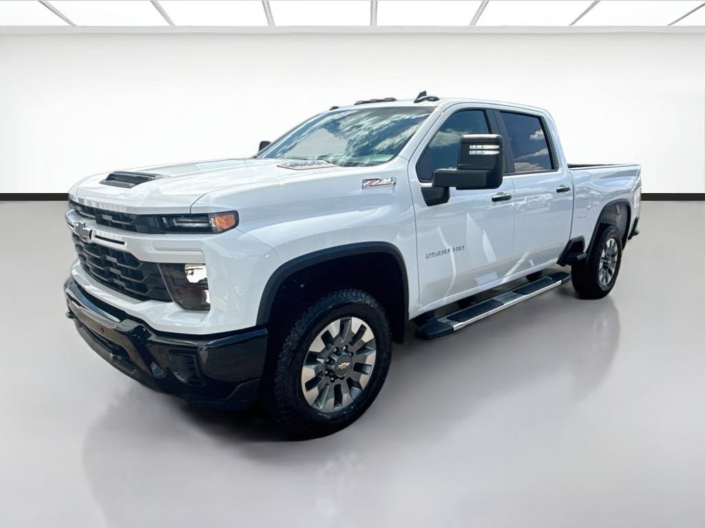 2026 Chevrolet Silverado 2500 HD Custom in Summit White — front three-quarter view