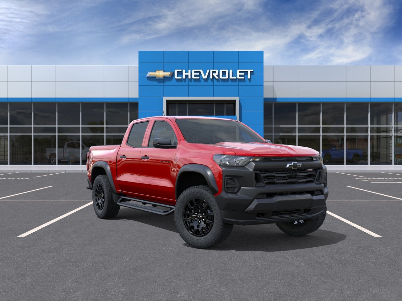 2026 Chevrolet Colorado Trail Boss in Radiant Red Tintcoat — front three-quarter view