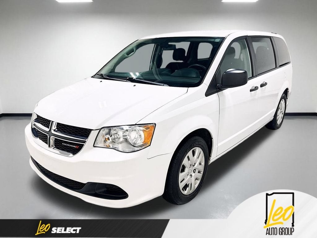 2019 Dodge Grand Caravan SE in White — front three-quarter view